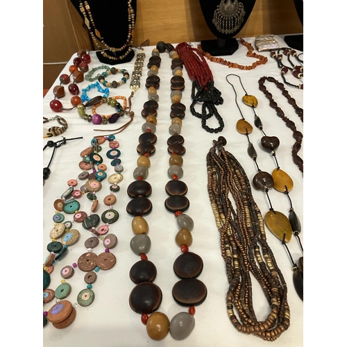 595 - Large Selection of Jewellery in natural materials to include wood and wooden combinations. Please se... 