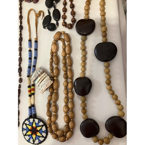 595 - Large Selection of Jewellery in natural materials to include wood and wooden combinations. Please se... 