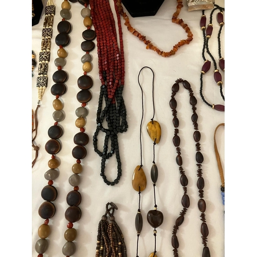 595 - Large Selection of Jewellery in natural materials to include wood and wooden combinations. Please se... 