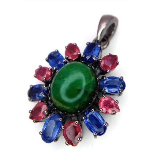 1466 - An Emerald Silver Pendant with Rubies & Kyanites. Oval cut Emeralds set in 925 Sterling silver. 13.3... 