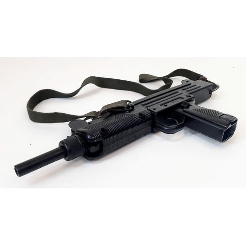 101 - A Deactivated Uzi 9mm Sub-Machine Gun. Nice condition with: Removable magazine, wood stock, sling an... 