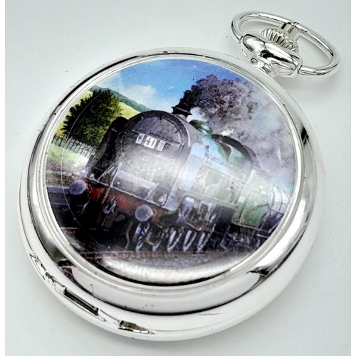 1158 - An Unused Silver Plated Manual Wind ‘Patriot Class 1930-65’ Steam Train Detailed Pocket Watch. 6cm L... 