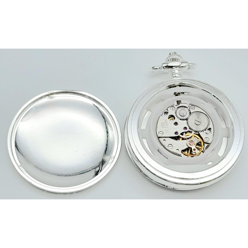 1158 - An Unused Silver Plated Manual Wind ‘Patriot Class 1930-65’ Steam Train Detailed Pocket Watch. 6cm L... 