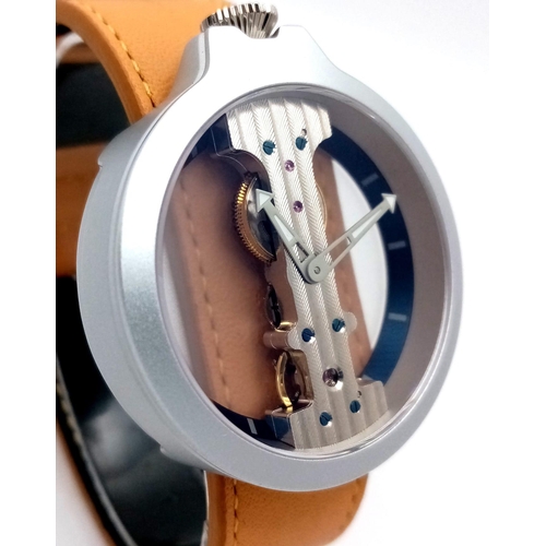 177 - A VERTICALE DOUBLE SKELETON TOP WIND WATCH ON A BROWN LEATHER STRAP