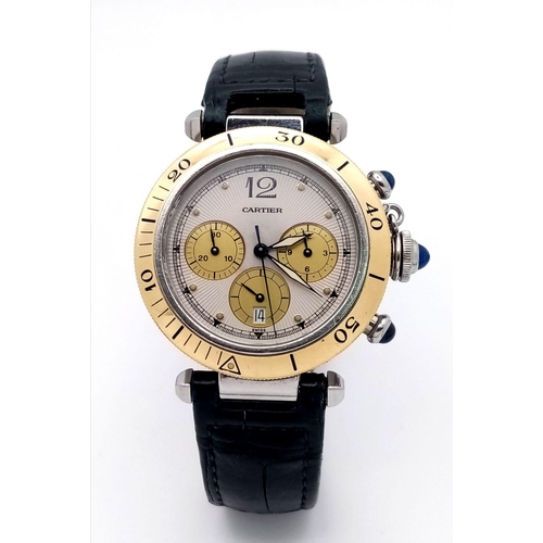 311 - A Cartier Pasha de Cartier Chronograph Watch. Black leather Cartier strap. Yellow gold and stainless... 