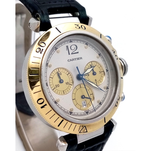 311 - A Cartier Pasha de Cartier Chronograph Watch. Black leather Cartier strap. Yellow gold and stainless... 