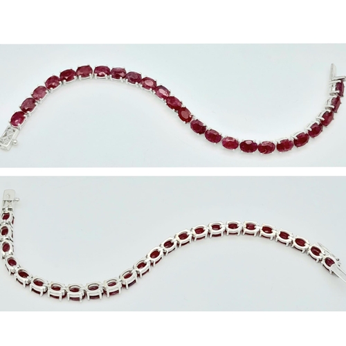 324 - A Ruby Gemstone Tennis Bracelet set in 925 Silver. 18cm. 17.2g weight. Ref: CD-1154