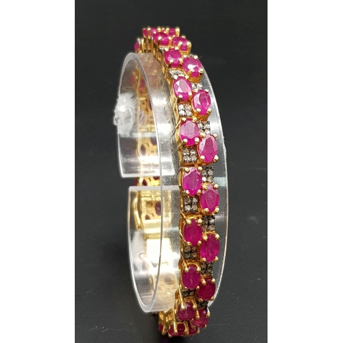 449 - A Gorgeous Two-Row Ruby Gemstone Tennis Bracelet with Diamond Accents set in 925 Gilded Silver. Diam... 