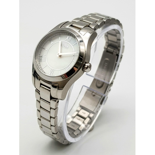 486 - A Ladies Quartz Watch by Boss Model HB267.3. 26mm Including Crown. Comes with Box, Papers and Spare ... 