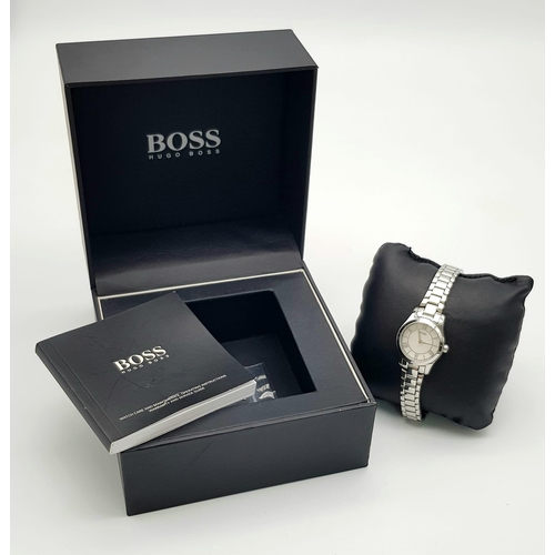 486 - A Ladies Quartz Watch by Boss Model HB267.3. 26mm Including Crown. Comes with Box, Papers and Spare ... 