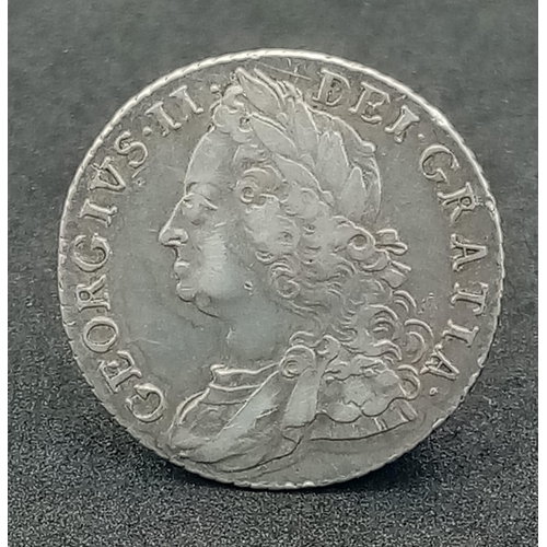 807 - A George II 1758 Silver Shilling. Please see photos for conditions.