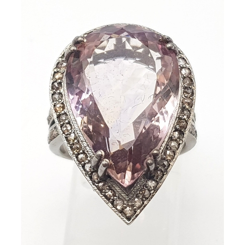 108 - A 15ct Amethyst Gemstone Ring with 0.90ctw of Diamonds set in 925 Silver. A beautiful pear shaped am... 