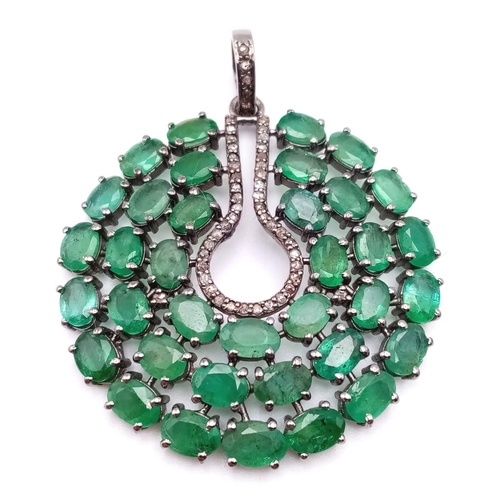 226 - An Emerald Circular Pendant with 13.55ct of Emeralds and 0.40ct of Diamond Accents set in 925 Silver... 