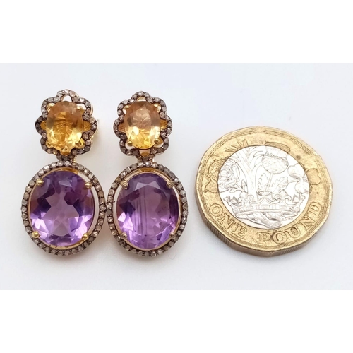 240 - A Pair of Amethyst and Citrine Gemstone Drop Earrings with Diamond Surrounds. Set in 925 gilded Silv... 