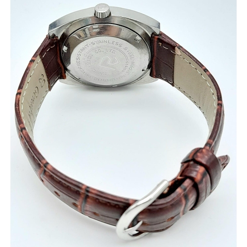 270 - A Vintage Ricoh 17 Jewel Automatic Gents Watch. Dark auburn leather strap. Stainless steel case - 36... 