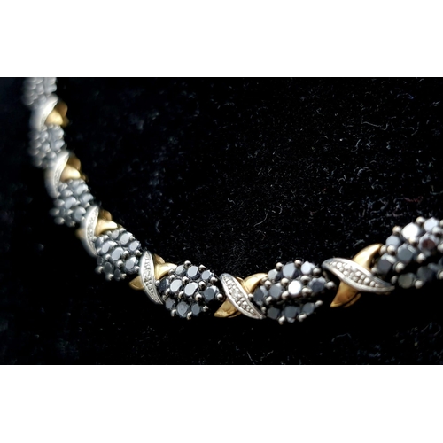 275 - A 9K YELLOW GOLD 2.75CT BLACK DIAMOND NECKLACE. TOTAL WEIGHT 21.6G. COME WITH BLACK LEATHER BOX & VA... 