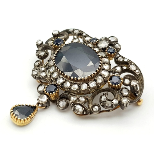 431 - A VICTORIAN NECK BROOCH IN CLASSIC STYLE WITH DIAMONDS AND SAPPHIRES SET IN HIGH CARAT GOLD .  20.2g... 