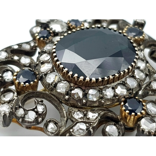 431 - A VICTORIAN NECK BROOCH IN CLASSIC STYLE WITH DIAMONDS AND SAPPHIRES SET IN HIGH CARAT GOLD .  20.2g... 