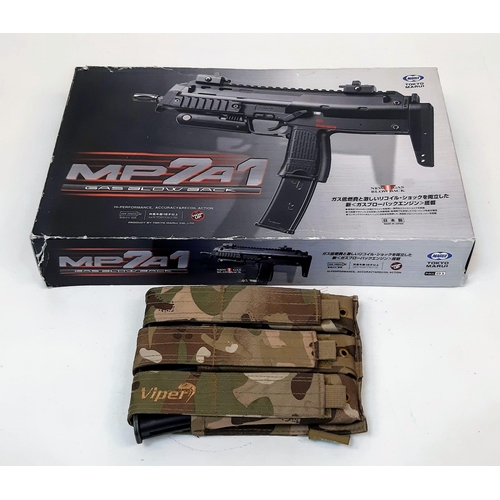 794 - One of the most sought after air soft guns on the market, the Tokyo Marui MP7 A1 gas blowback gun wi... 