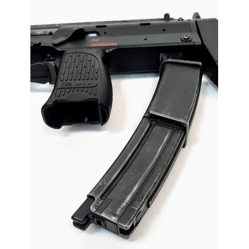 794 - One of the most sought after air soft guns on the market, the Tokyo Marui MP7 A1 gas blowback gun wi... 