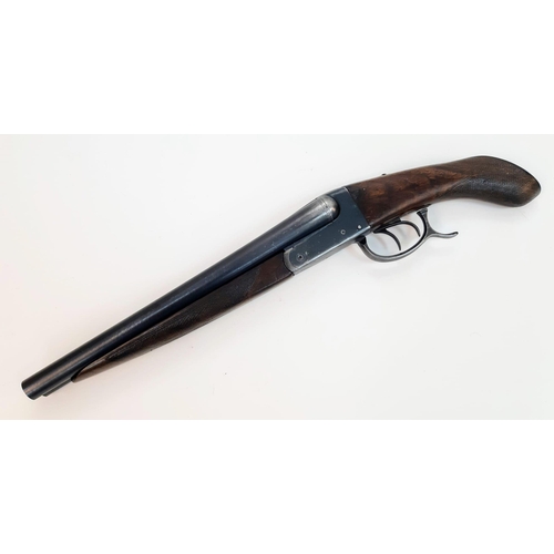 1811 - A Vintage Deactivated 12 Gauge Side by Side Sawn-Off Shotgun. This British made gun has 11.75 inch b... 