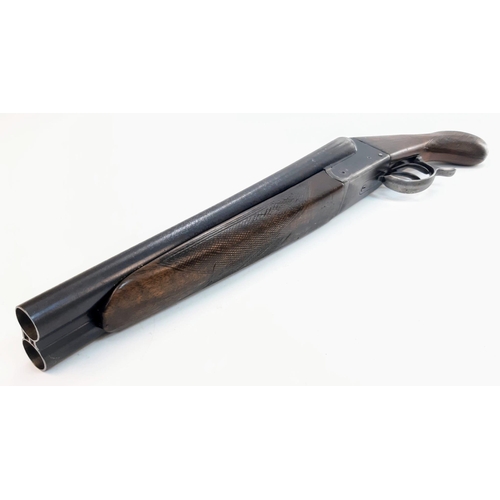 1811 - A Vintage Deactivated 12 Gauge Side by Side Sawn-Off Shotgun. This British made gun has 11.75 inch b... 