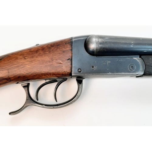 1811 - A Vintage Deactivated 12 Gauge Side by Side Sawn-Off Shotgun. This British made gun has 11.75 inch b... 