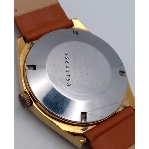 1032 - A Rado Voyager Automatic Gents Watch. Brown leather strap. Gilded stainless steel case - 36mm. Gilde... 