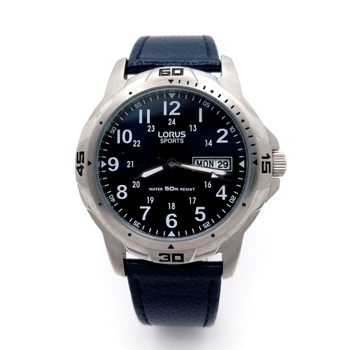 1053 - A Gents Sports Lorus Watch. Blue leather strap. Stainless steel case - 38mm. Blue dial with day/date... 