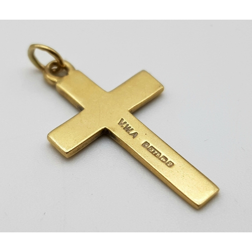 1111 - A 9K GOLD CROSS PENDANT .   1.4gms