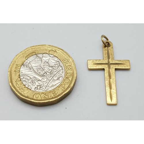 1111 - A 9K GOLD CROSS PENDANT .   1.4gms