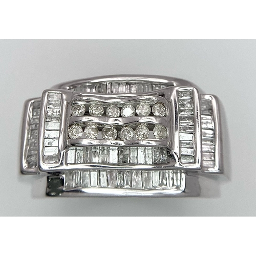 577 - A FABULOUS 9K WHITE GOLD GENTS RING WITH 1CT OF DIAMONDS TO ENHANCE THIS HANDSOME PIECE OF JEWELLERY... 