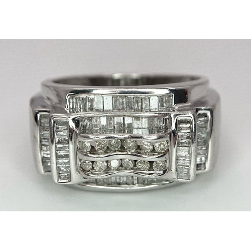 577 - A FABULOUS 9K WHITE GOLD GENTS RING WITH 1CT OF DIAMONDS TO ENHANCE THIS HANDSOME PIECE OF JEWELLERY... 