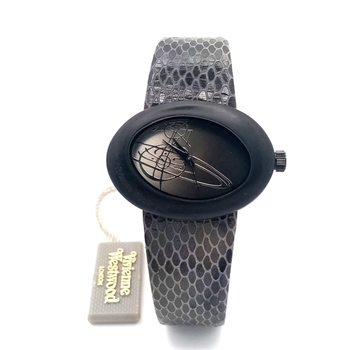 859 - A Vivienne Westwood Oval Cased Quartz Ladies Watch. Grey leather strap. Ceramic oval case - 35mm. In... 