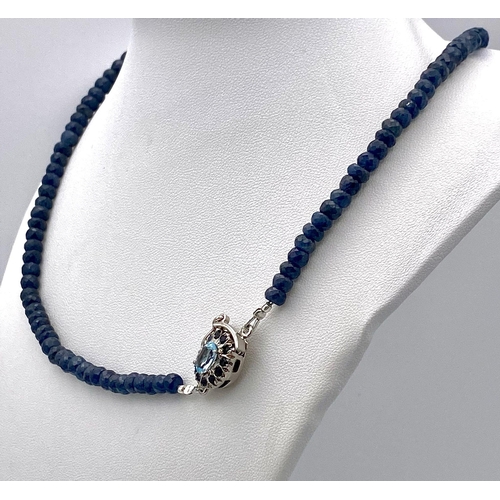 598 - A 170ctw Faceted Blue Sapphire Rondelle Necklace with Blue Topaz Clasp - Set in 925 Silver. 44cm. 35... 