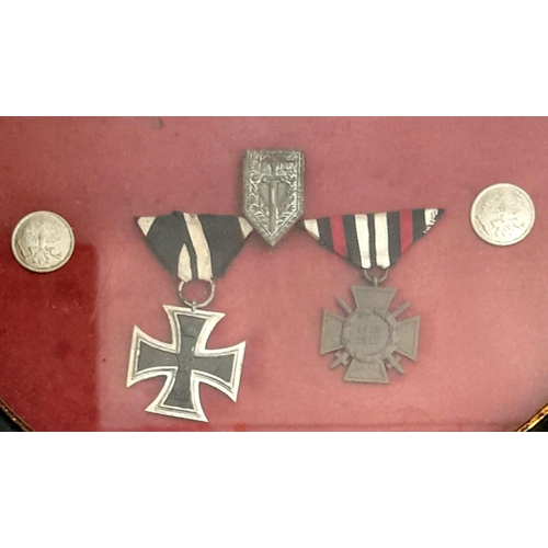 636 - Framed WW1 Imperial German Iron Cross 2 nd class and Hindenburg Field Service Cross, along with a ph... 