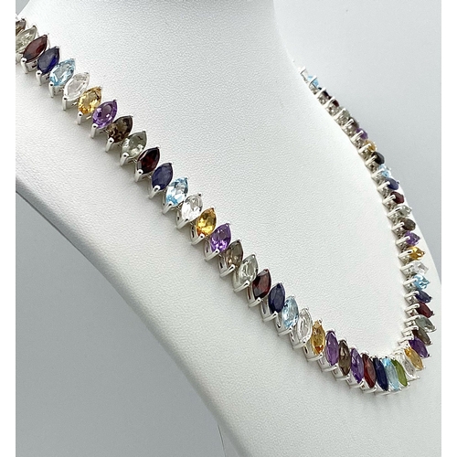 676 - An Electrifying Marquise Cut Multi-Colour Gemstone Necklace: Amethyst, Citrine, Garnet, and Aquamari... 