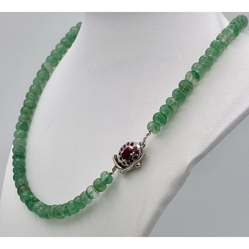 765 - A 210ctw Emerald Rondelle Gemstone Necklace with Ruby Clasp - Set in 925 Silver. 44cm length. Ref: C... 