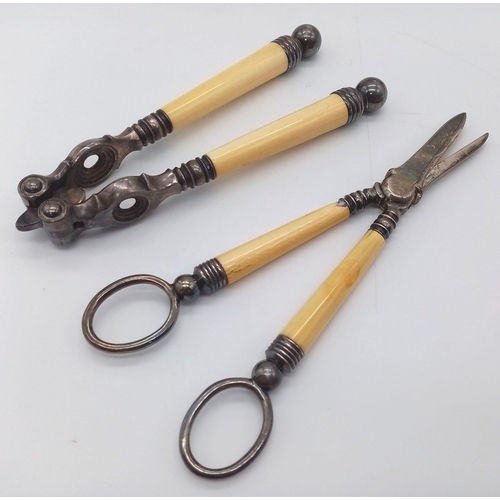 907 - A PAIR OF VICTORIAN BONE HANDLED UTENSILS , NUT CRACKERS AND GRAPE SCISSORS (SCISSORS HAVE A CHIP IN... 