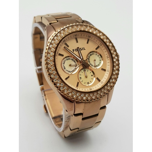 996 - A Gold Tone, Clear Stone Set Bezel Watch by Fossil. 40mm Including Crown. Full Working Order.