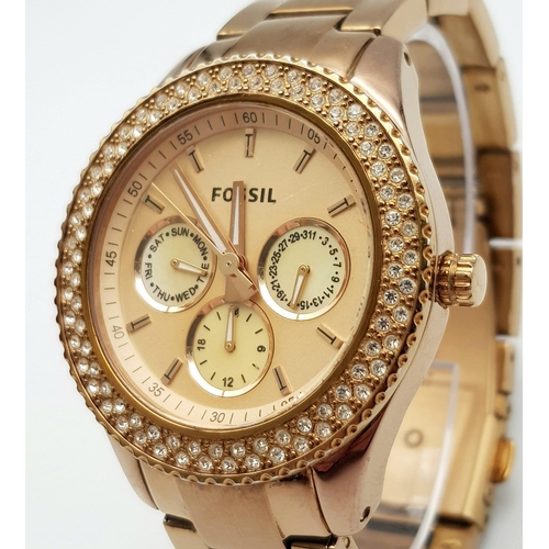 996 - A Gold Tone, Clear Stone Set Bezel Watch by Fossil. 40mm Including Crown. Full Working Order.