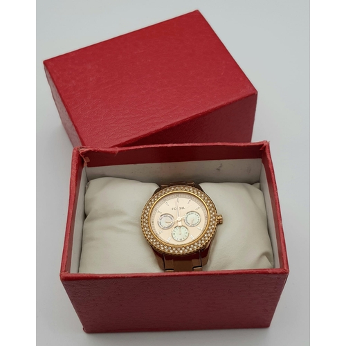 996 - A Gold Tone, Clear Stone Set Bezel Watch by Fossil. 40mm Including Crown. Full Working Order.