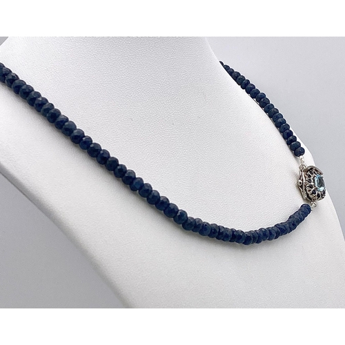 598 - A 170ctw Faceted Blue Sapphire Rondelle Necklace with Blue Topaz Clasp - Set in 925 Silver. 44cm. 35... 