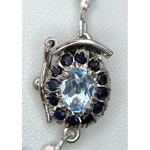 598 - A 170ctw Faceted Blue Sapphire Rondelle Necklace with Blue Topaz Clasp - Set in 925 Silver. 44cm. 35... 