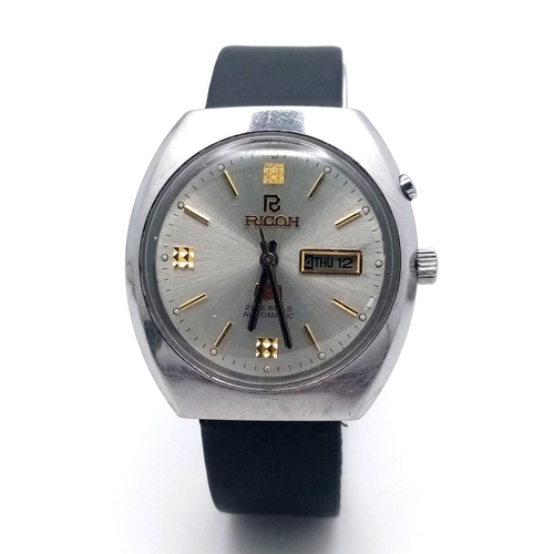 614 - A Vintage Ricoh 21 Jewel Automatic Gents Watch. Black leather strap. Stainless steel case - 37mm. Si... 