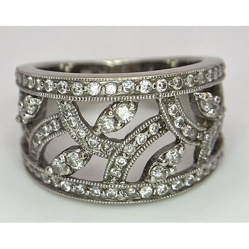 100 - A Six Ring 18K White Gold Bonanza! To include: (1) Diamond half eternity with centre diamond - Size ... 