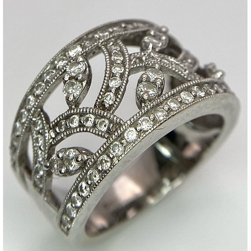 100 - A Six Ring 18K White Gold Bonanza! To include: (1) Diamond half eternity with centre diamond - Size ... 