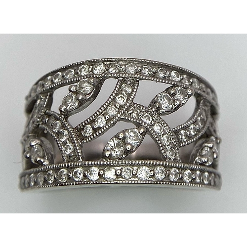 100 - A Six Ring 18K White Gold Bonanza! To include: (1) Diamond half eternity with centre diamond - Size ... 