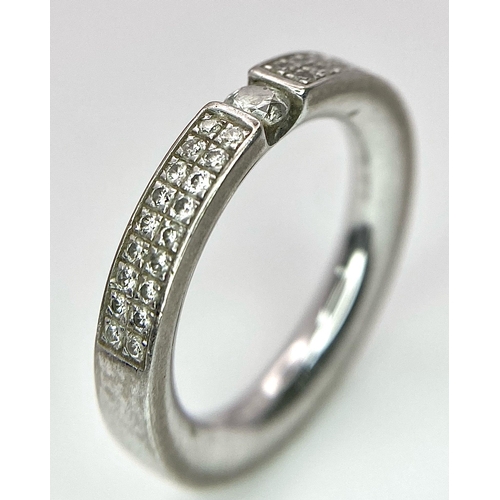 100 - A Six Ring 18K White Gold Bonanza! To include: (1) Diamond half eternity with centre diamond - Size ... 