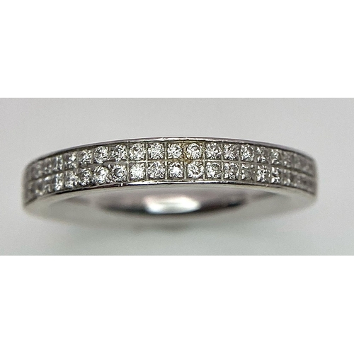 100 - A Six Ring 18K White Gold Bonanza! To include: (1) Diamond half eternity with centre diamond - Size ... 